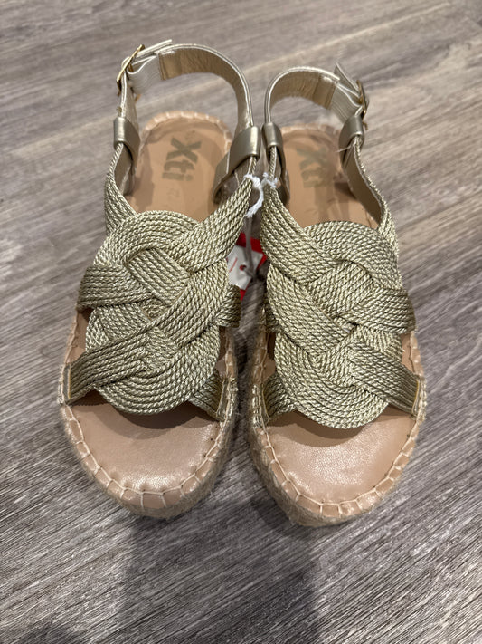 XTI Carmella Oro